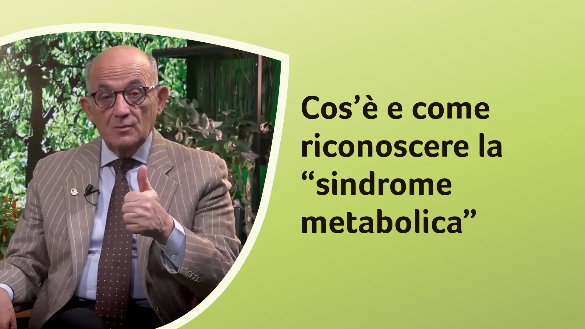 Il dottor Rossi in primo piano, seduto in un ambiente arredato con piante. Sullo sfondo è riportato il titolo dell'episodio "Cos’è e come riconoscere la 'sindrome metabolica'".