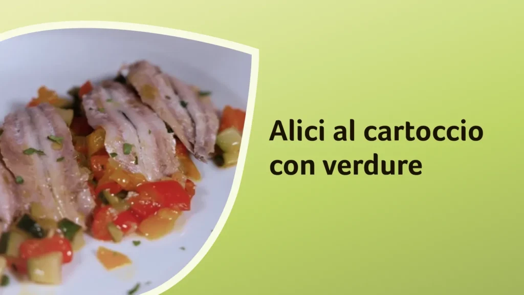 piatto di alici sopra un letto di verdure