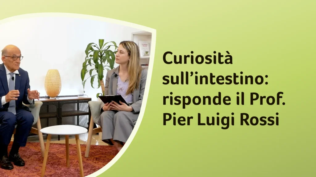 Il dottor Rossi conversa con la dottoressa Freddoni in uno studio con una lampada e una pianta. Sullo sfondo è riportato il titolo dell'episodio "Curiosità sull'intestino: risponde il Prof. Pier Luigi Rossi"